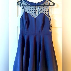 Women’s sleeveless party dress with mesh bodice